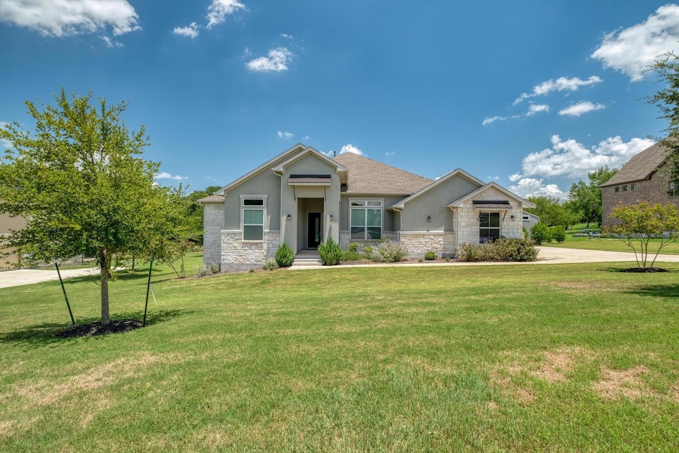 Craftsman house featuring stone siding, stucco si