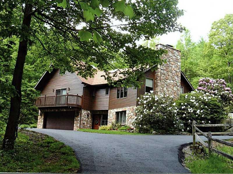 Exterior Front. Beautiful Stone and Cedar Exterior