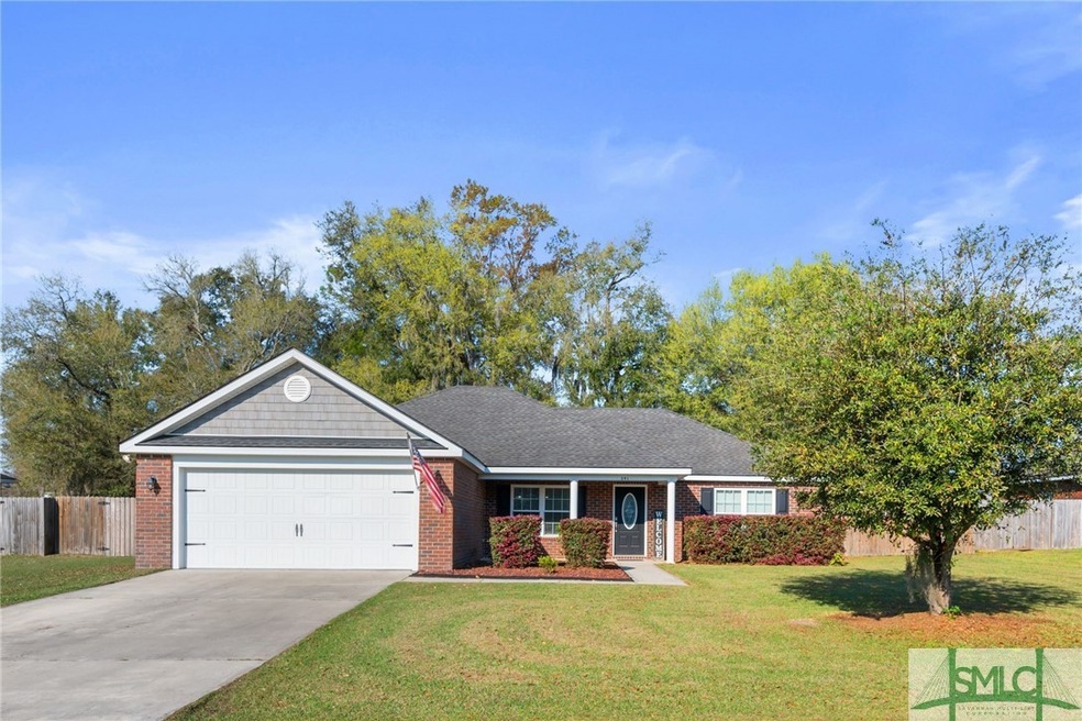 391 NE Mancey Garrason Loop a darling brick home.