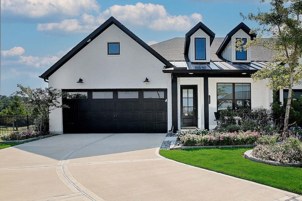 14266 Juniper Breeze Ct, Willis, TX 77318 - photo 1