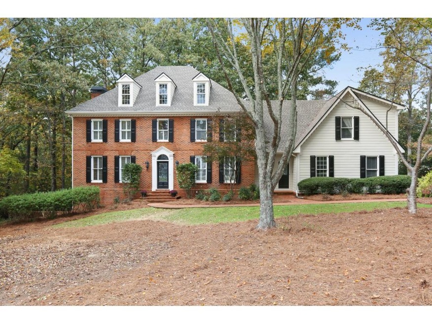 Fantastic corner lot with private wooded setting. 