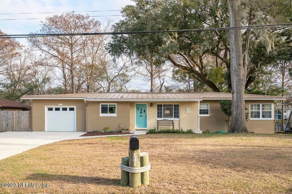 3841 Cedar Forest Dr E, Jacksonville, FL 32210 - photo 1