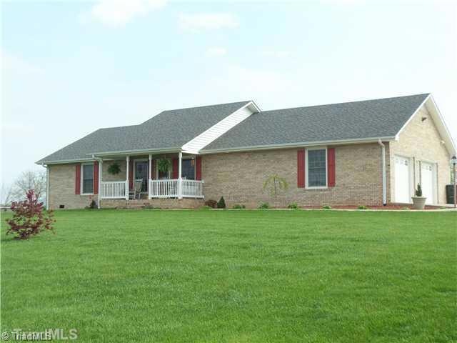 Exterior Front. Enter Spring Hill Estates, A quiet Cul de Sac. Concrete Driveway.
