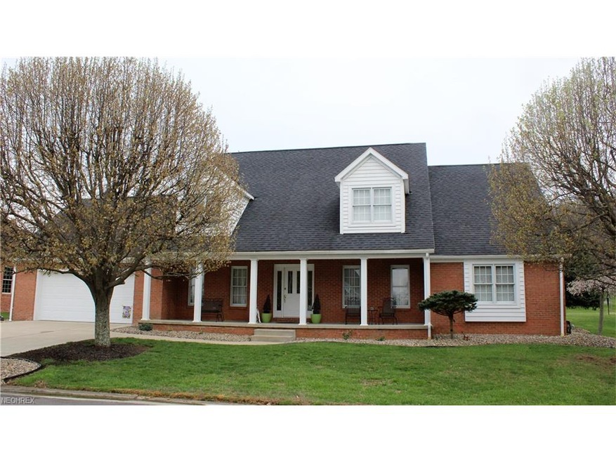 Immaculate Brick and Cedar Cape Cod with gorgeous 