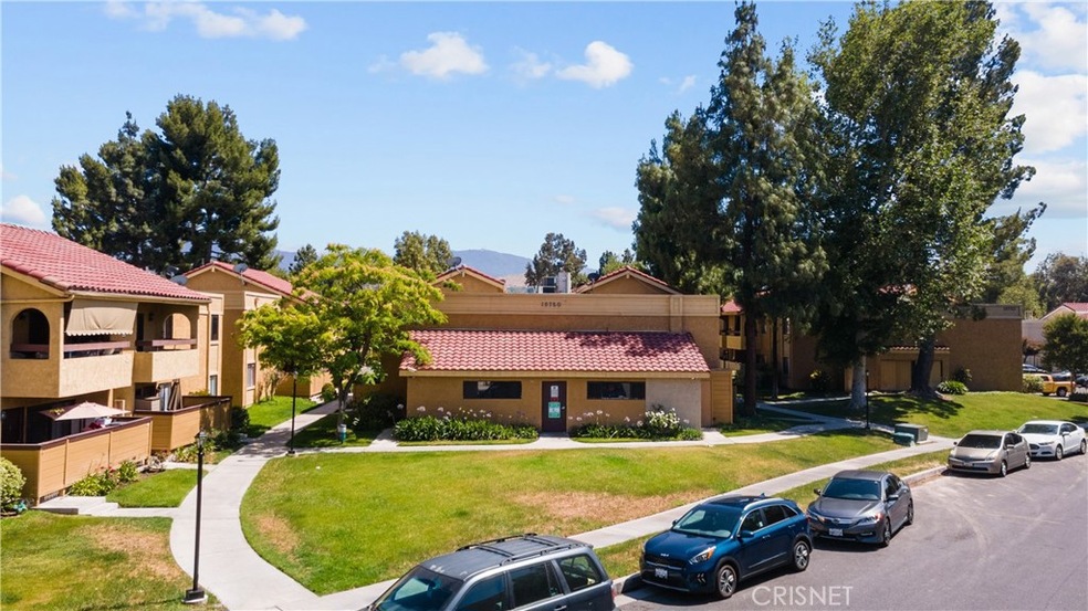 Subject unit is behind this community room.