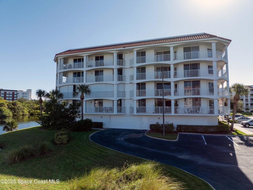 8935 Puerto Del Rio Dr unit 401, Cape Canaveral, FL 32920 - photo 1