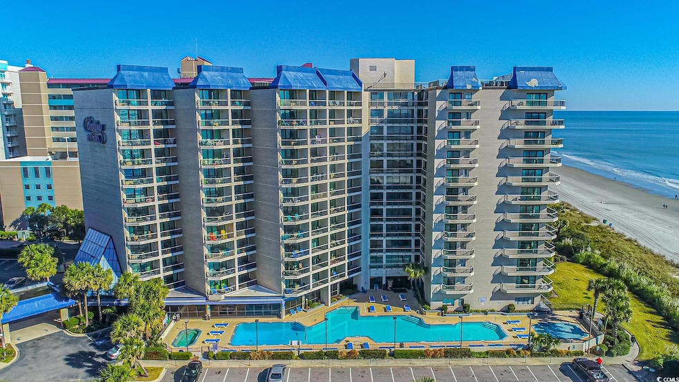 View of building exterior with a water view and a 