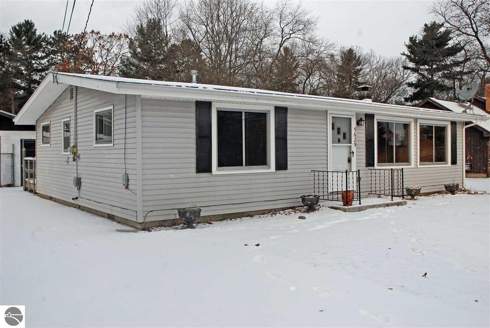 Vinyl siding protects the exterior of this two bed