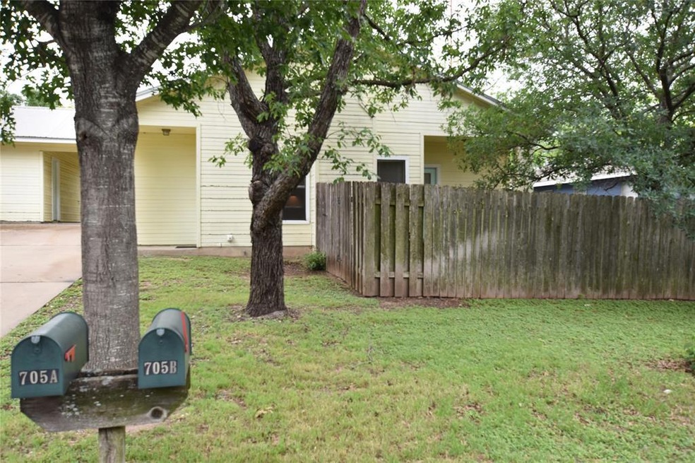 WELL MAINTAINED DUPLEX WITH LARGE TREES, METAL ROOF, CARPORT ON CULDESAC. 