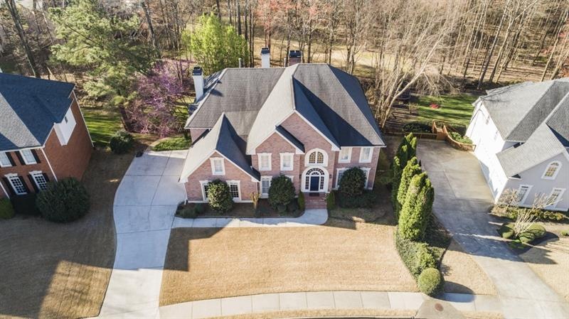 Green space behind this house means you have good 
