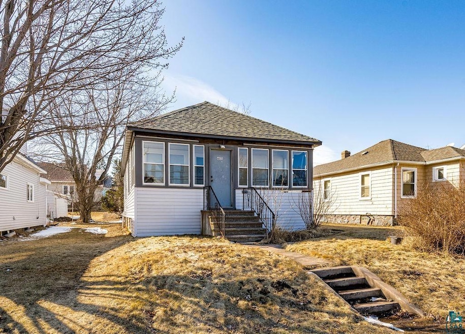 View of front of property featuring entry steps an