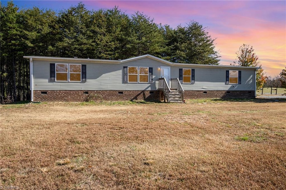 Welcome Home to 5061 Reid Road in the Stone Ridge subdivision! This 4 Bedroom, 2 Bath home has a Spacious Open Floorplan and is situated on 5+ acres.