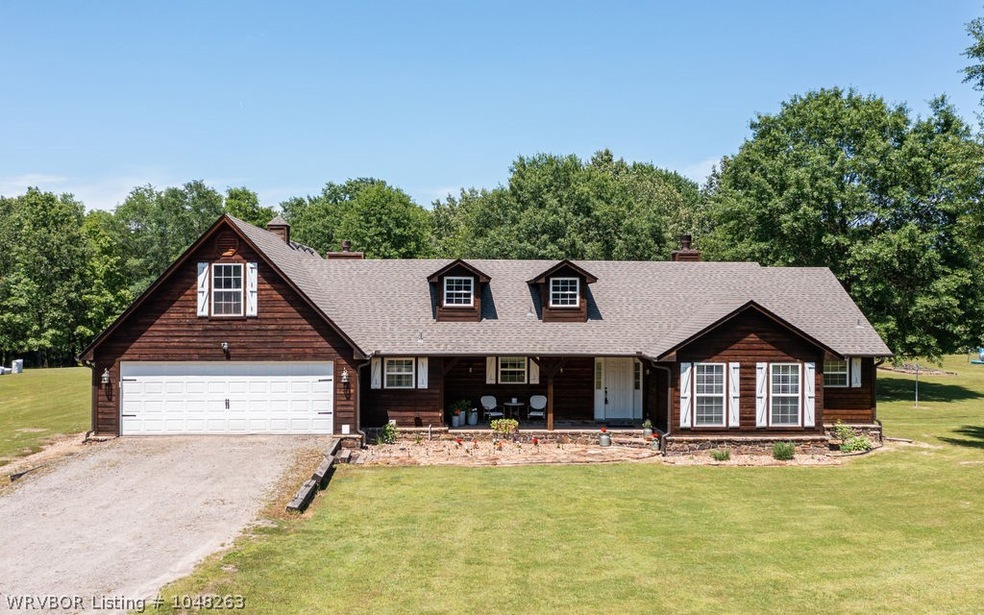 Beautiful Farmhouse Home sitting on 5 Acres.