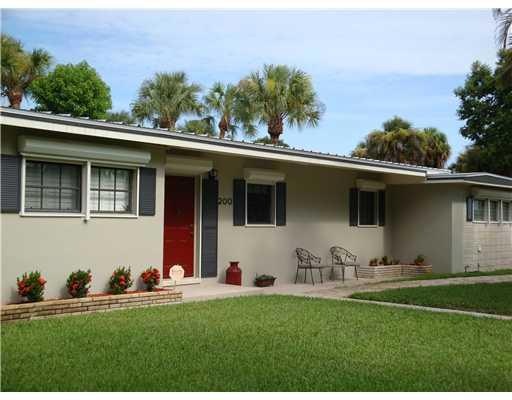 Exterior Front. Corner Lot & Large Driveway