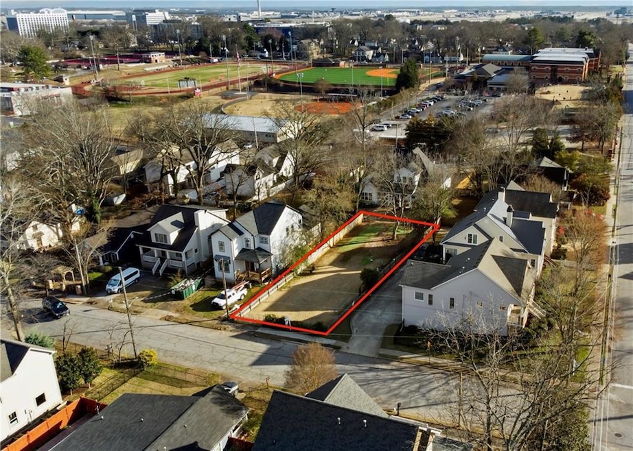 Aerial perspective of suburban area with property parcel outlined