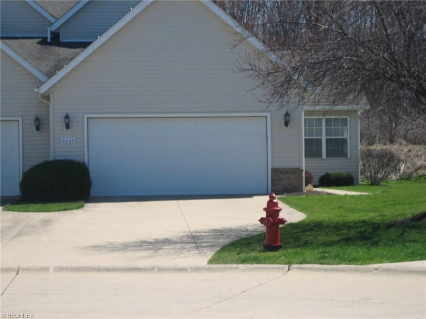 8857 Ashlyn Ct unit 15B, Olmsted Falls, OH 44138 - photo 1