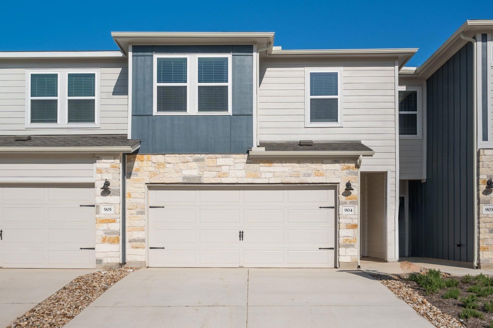 Multi unit property featuring an attached garage,