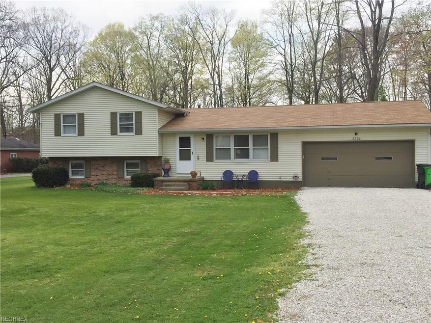 Welcome home to this lovely 4 level split in a qui