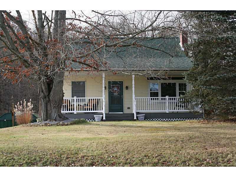 Exterior Front. Maintenance free front porch to en