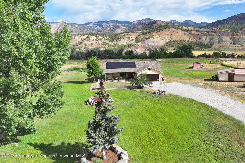 Creekside Home with Acreage For Sale in