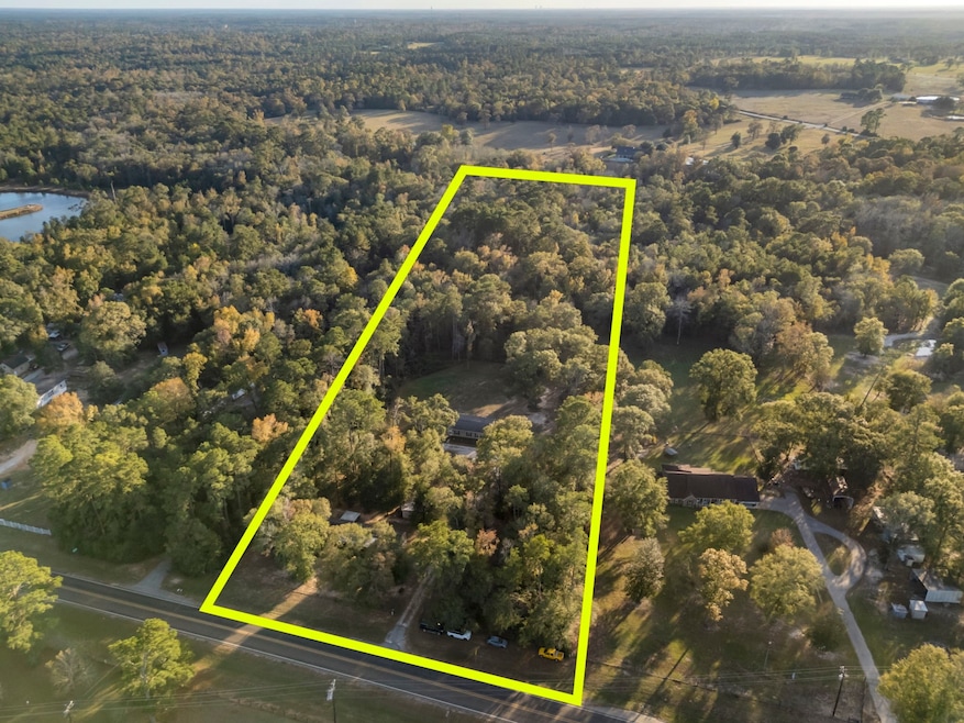 Nestled on 8.44 acres of land, this double-wide manufactured home offers spacious living with the added bonus of a single wide guest home, providing a perfect blend of comfort and versatility.