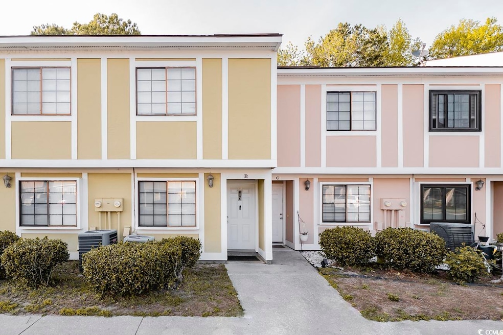 Townhome / multi-family property with stucco sidin