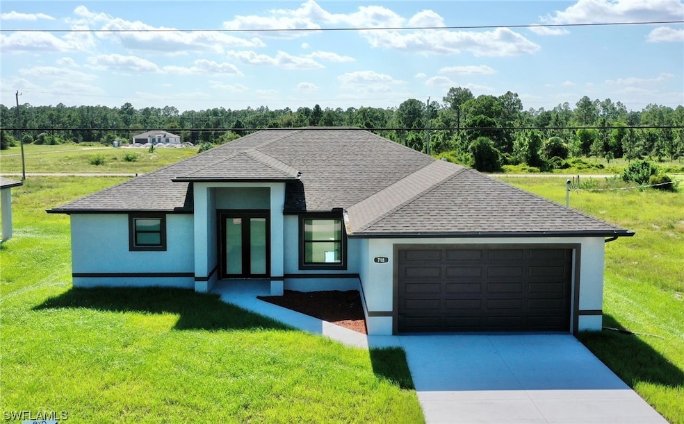 718 Downer Ave S, Lehigh Acres, FL 33974 - photo 1