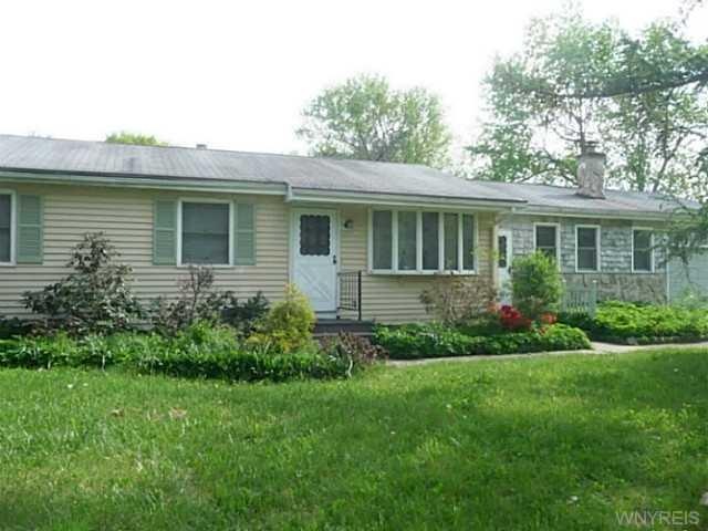 Exterior Front Welcome home! Quiet road home on a 