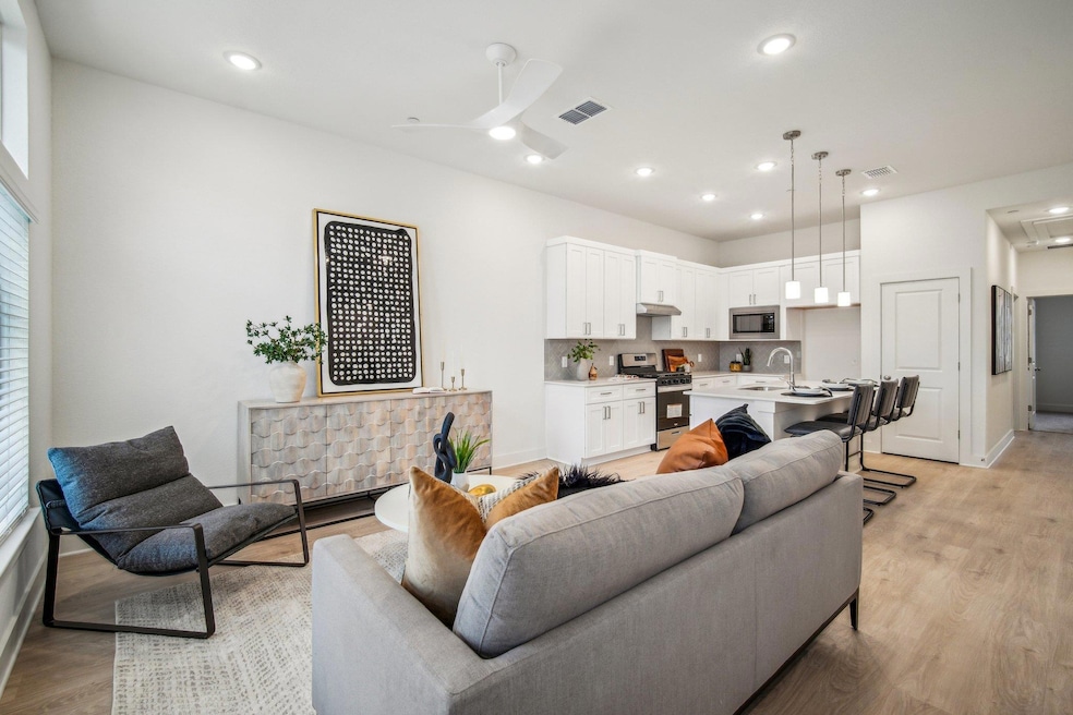 Living area featuring light wood-style flooring, 