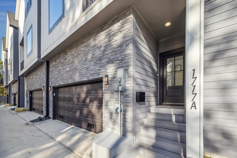A stunning stonework exterior graces the front fac