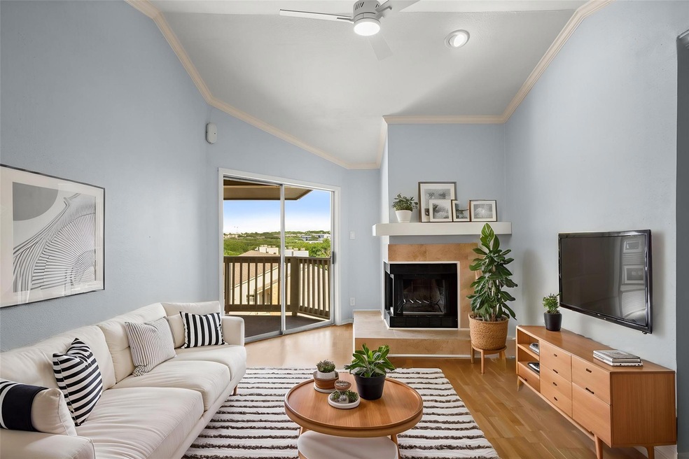 Living room with vaulted ceiling, wood finished f