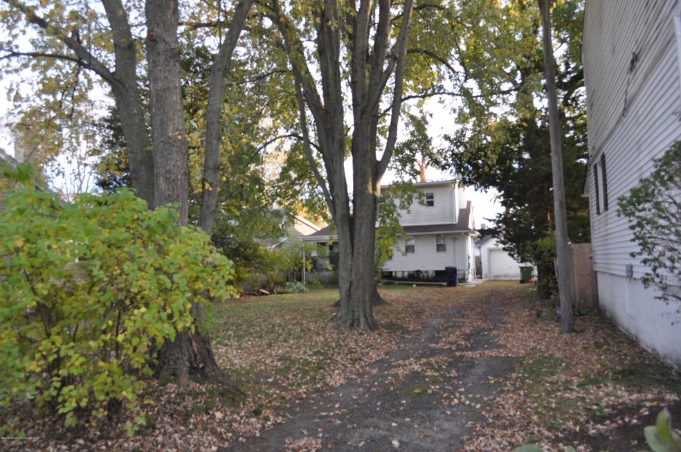 HOME SITS ON LARGE LOT