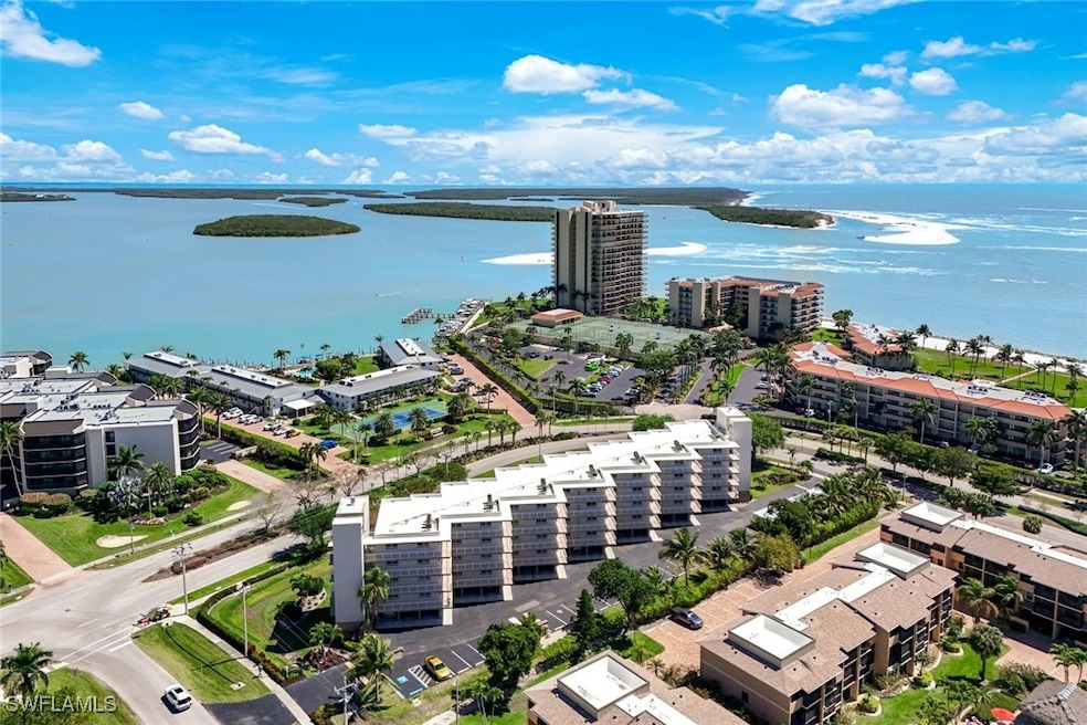 Aerial view with a water view and a city view