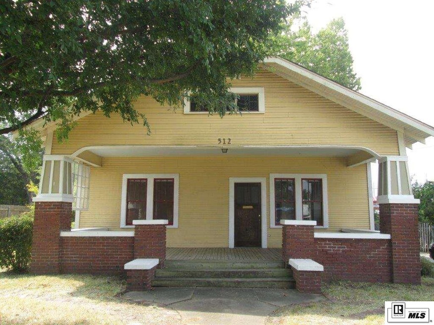 512 E Madison Ave, Bastrop, LA 71220 - photo 1