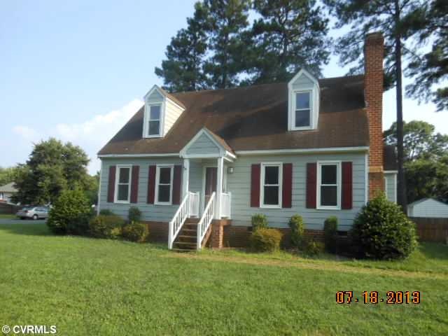 Exterior Front - Cape located on corner lot