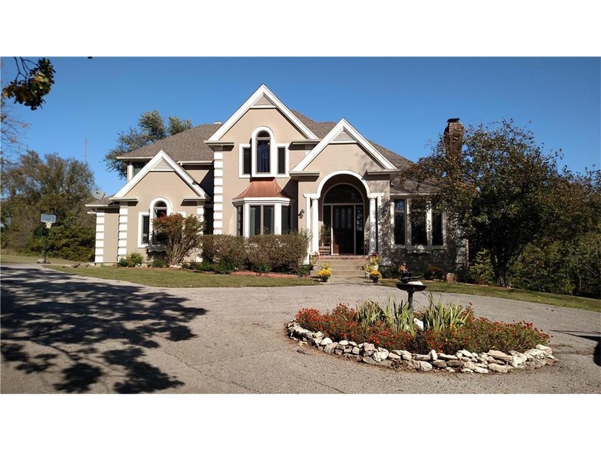 Stately Home with Circle Drive Off Blacktop Road (