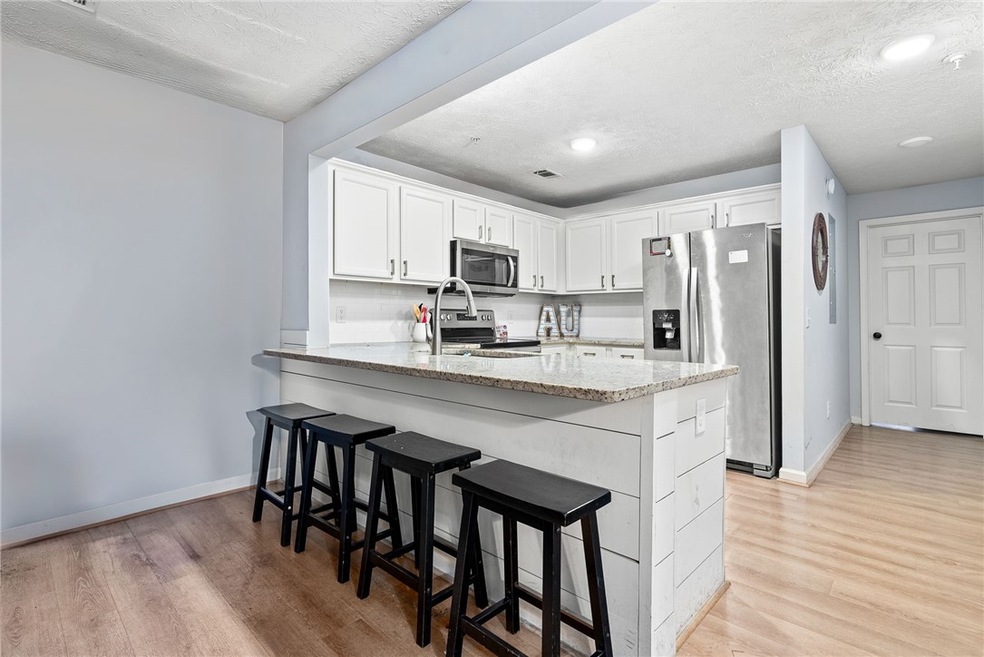 Welcome to your UPDATED Edge West Condo!