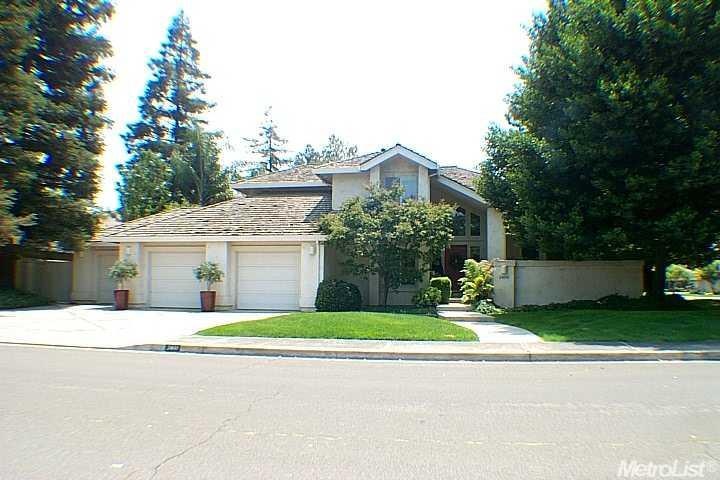 Front view of home with 3 car garage. Private cour