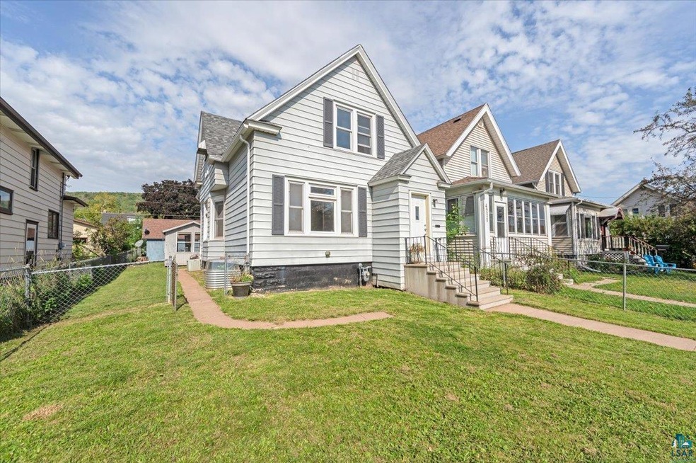 View of front of home with a front yard