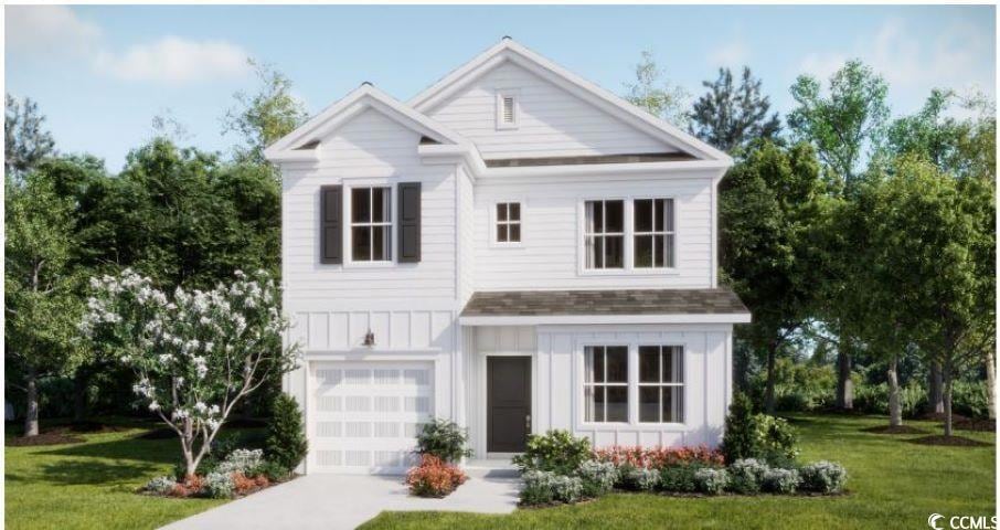 View of front facade featuring an attached garage,
