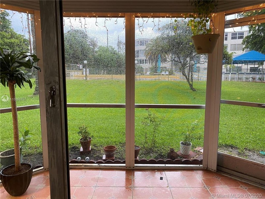 1701 NE 191st St unit A105, Miami, FL 33179 - photo 1