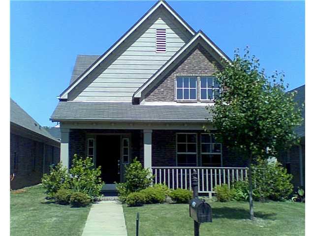 Large Front Porch.  Door with Side Lights.  Lots o