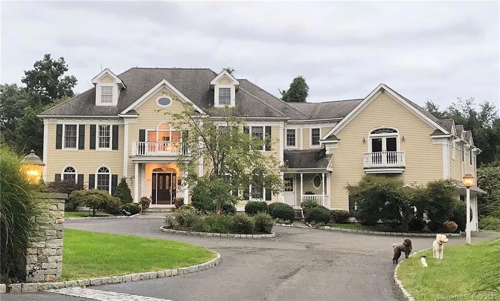 Stately center hall colonial in desirable enclave 