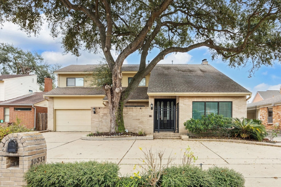 10314 Piping Rock Ln, Houston, TX 77042 - photo 1