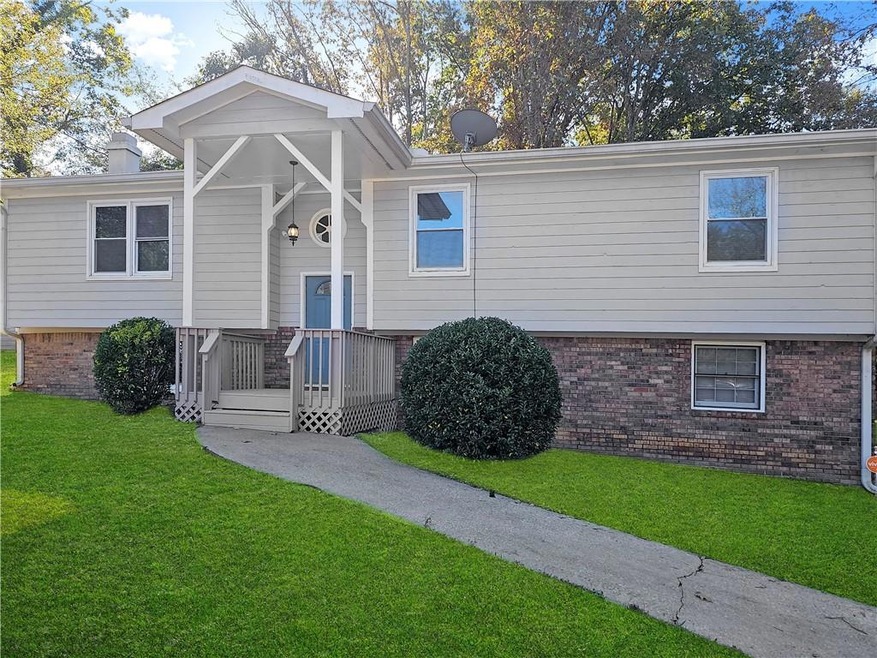 View of front of property with a front lawn