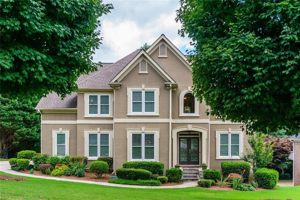 3 car garage home with a flat back yard, tucked aw