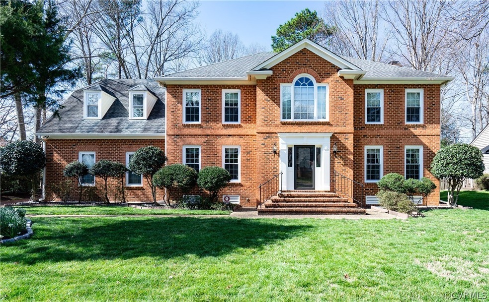 Thee sides brick with large, level, cul-de-sac lot