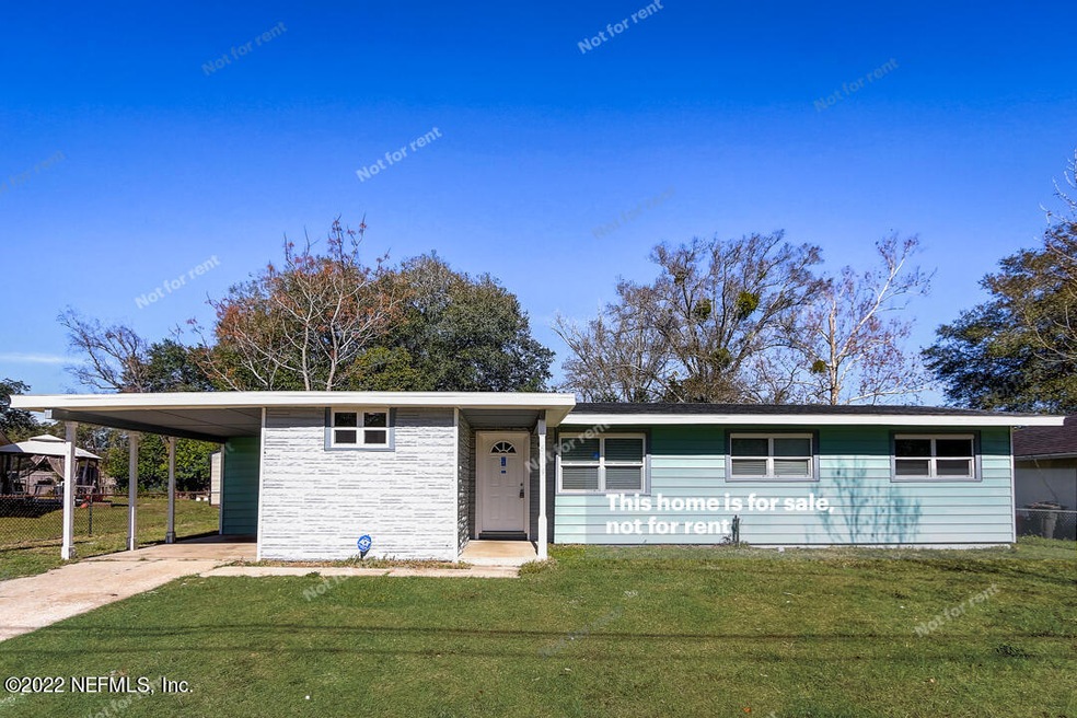 6879 Snow White Dr, Jacksonville, FL 32210 - photo 1