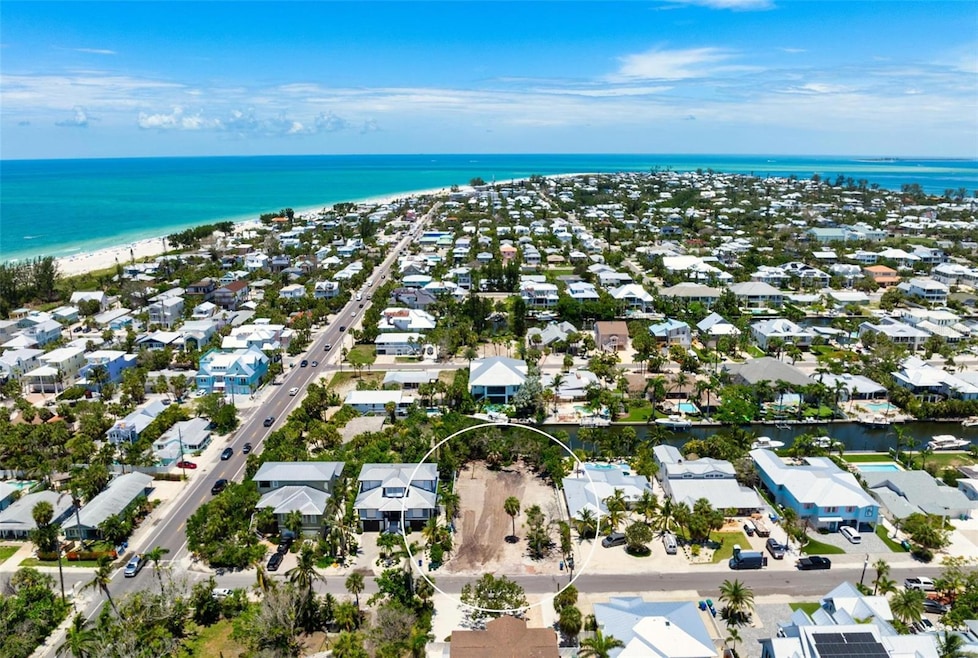 Welcome to 208 Oak Avenue!! Over a 14,0000. sq. ft Lot, 1 block from the Gulf of Mexico and has beach access at the end of Oak Ave., located on a saltwater canal which goes out to the Gulf and Intercoastal waterways.