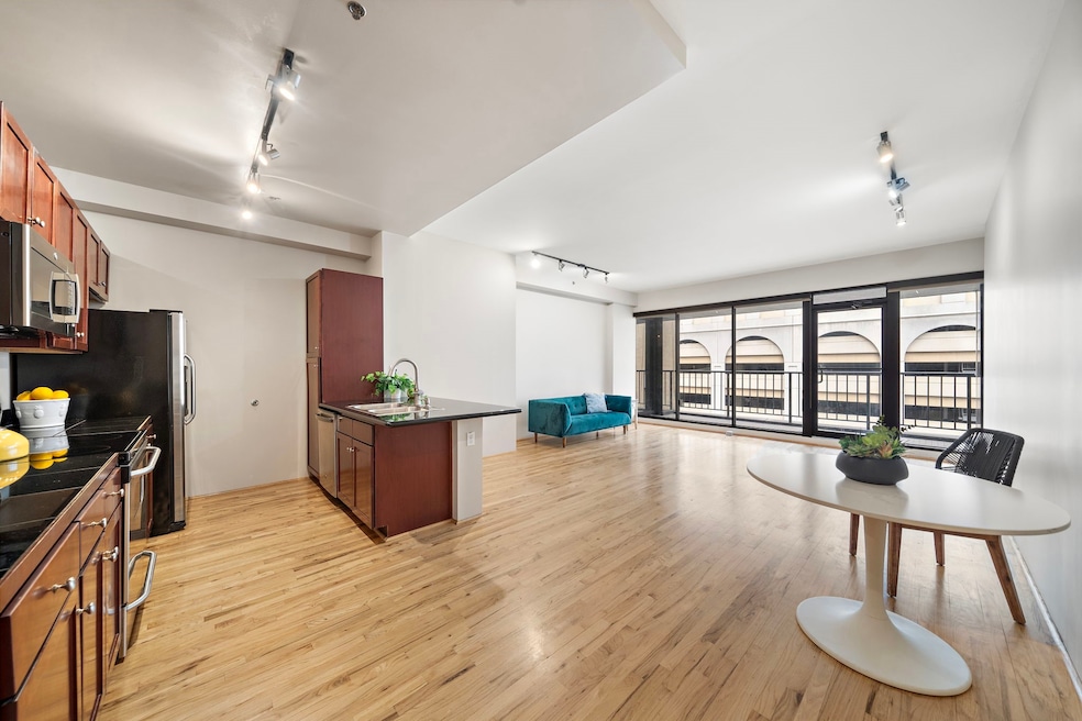 Open living area and kitchen with room for a dinin